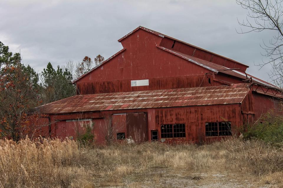  The large building has fallen into ruin since becoming derelict, with smashed windows and rusted roof panels