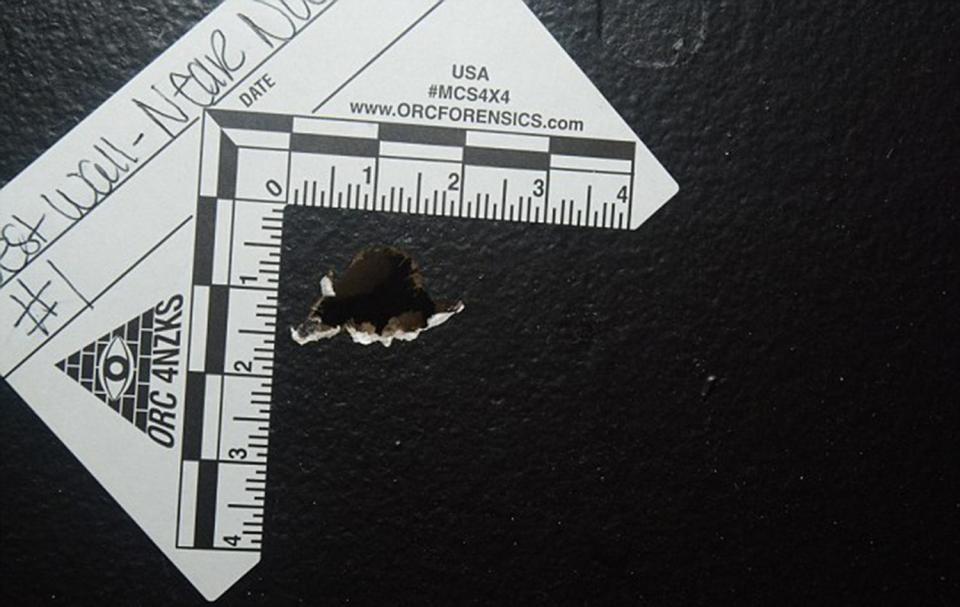  This police image shows a bullet hole at the concert venue in Orlando