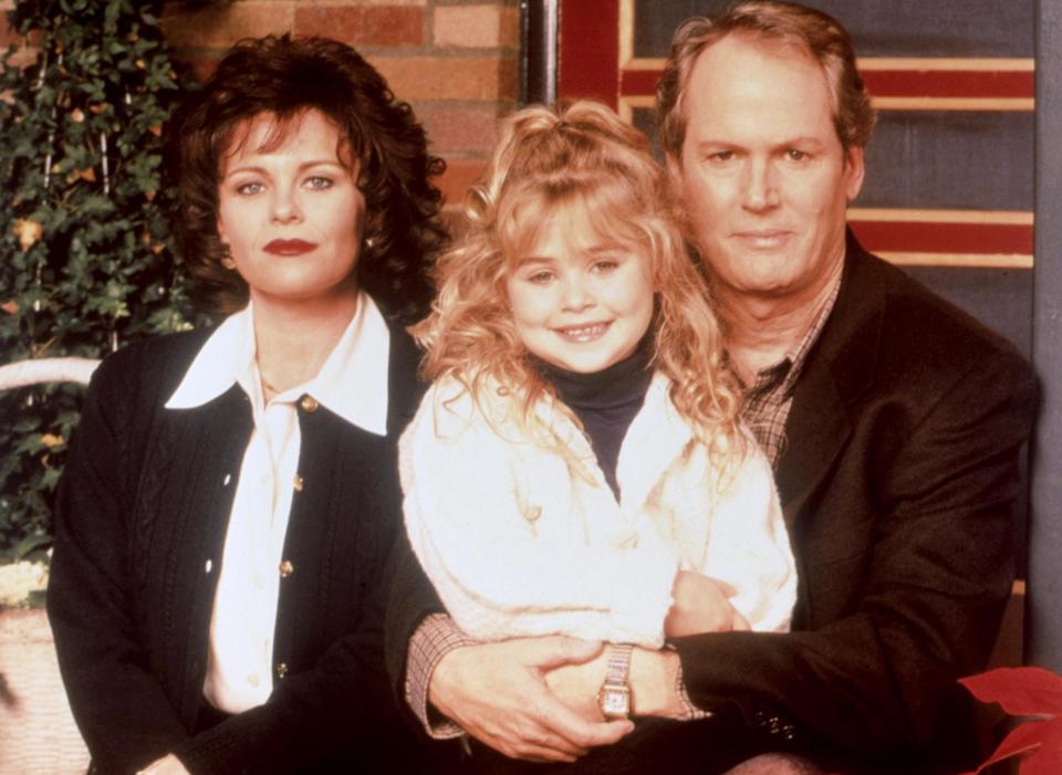  JonBenet was found murdered in her family's basement hours after being reported missing by parents Patsy and John, pictured together