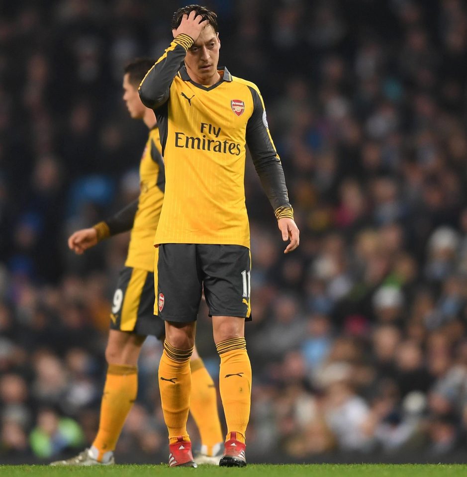  Mesut Ozil needs to pull his socks up but shouldn't be singled out