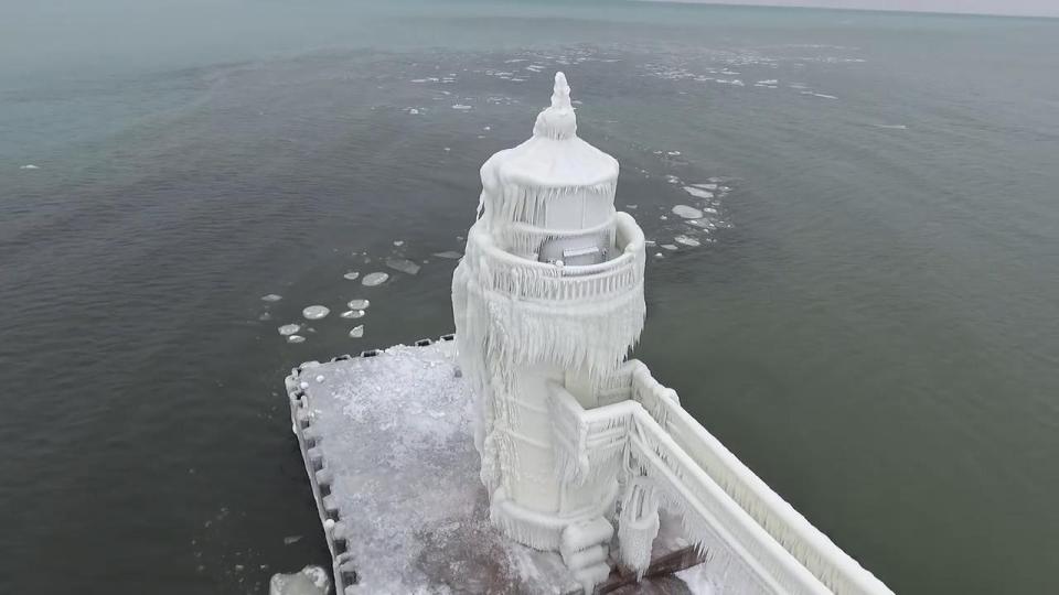 Drone shots show the St Joseph Light house on Lake Michigan transformed into the magical castle