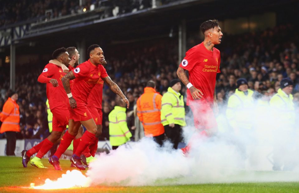  Flares were thrown onto the pitch as Sadio Mane celebrated his winner