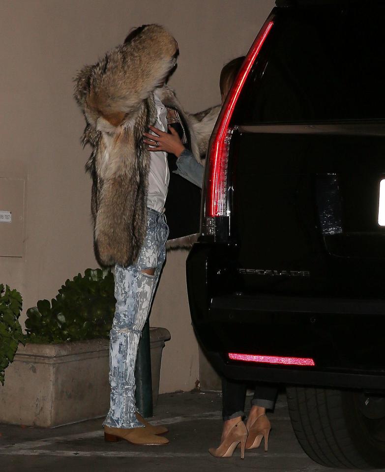  Justin was seen speaking with a female companion before making his way into his car