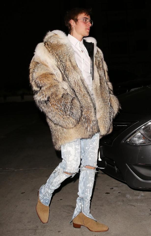  Justin Bieber was wrapped up warm as he headed out to dinner in a fur coat on Monday