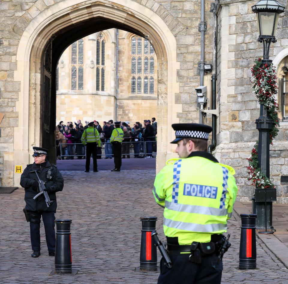  One police officer keeps watch by Windsor Castle