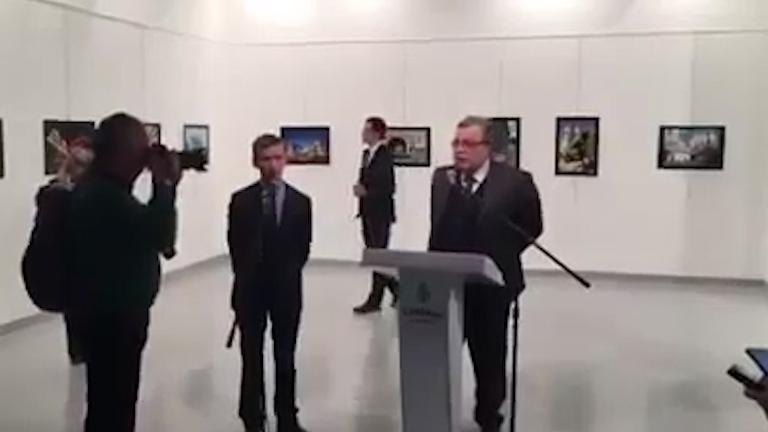  He paces around nervously as the ambassador gives a speech at an art gallery in Ankara