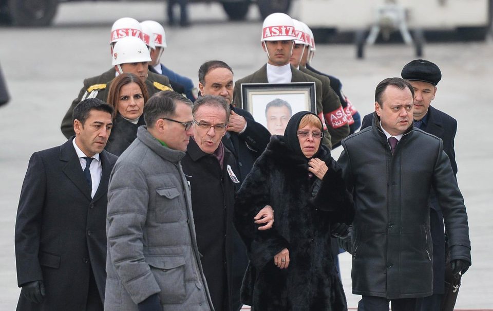  Members of a Turkish forces honour guard carry the Russian flag-draped coffin of Russian Ambassador to Turkey Andrei Karlov who was assassinated on Monday