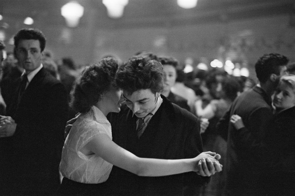  A teddy boy shares a tender moment with his girl on the dancefloor at the Mecca Dance Hall in Tottenham