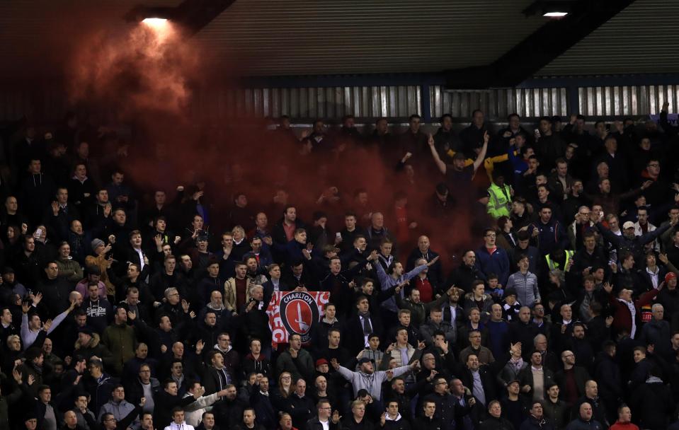  Charlton fans set off a smokebomb at The Den