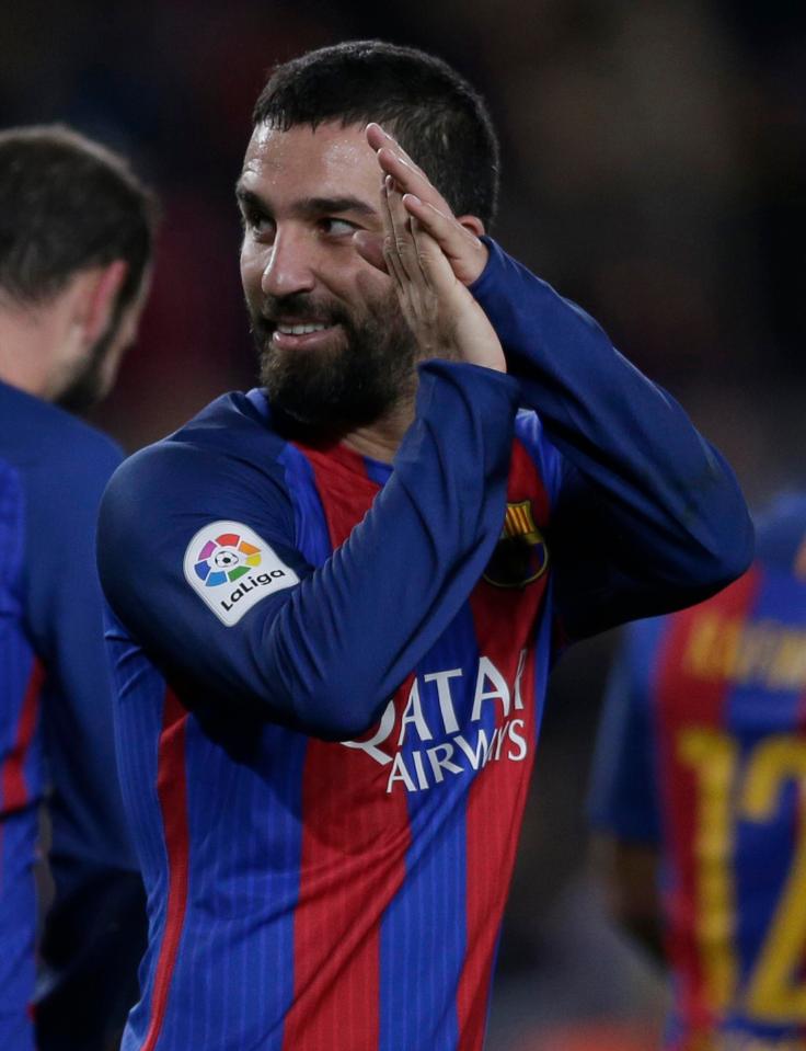  Arda Turan grabbed a hat-trick as Barcelona ran riot against Hercules