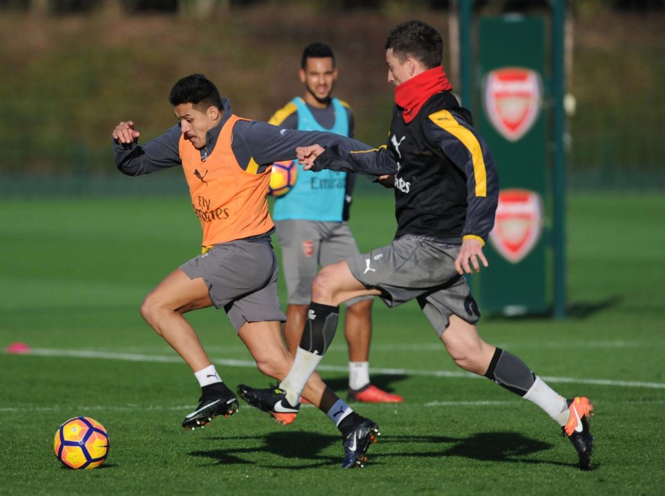  Alexis Sanchez led the way at Arsenal's training session this morning