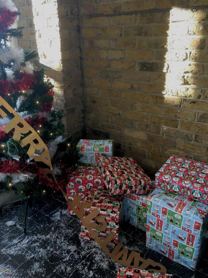  The Christmas banner has collapsed and been left on the ground