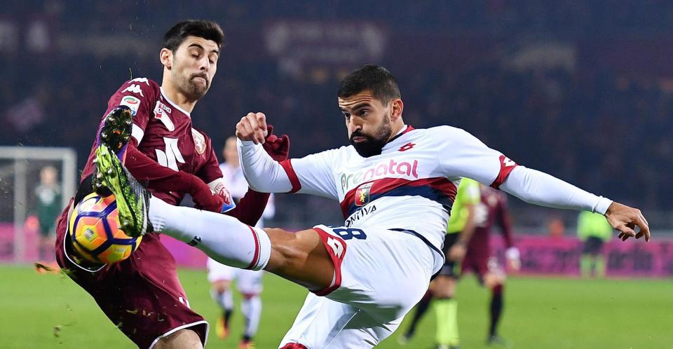  Torino's Marco Benassi and Genoa's Tomas Rincon battle for the ball