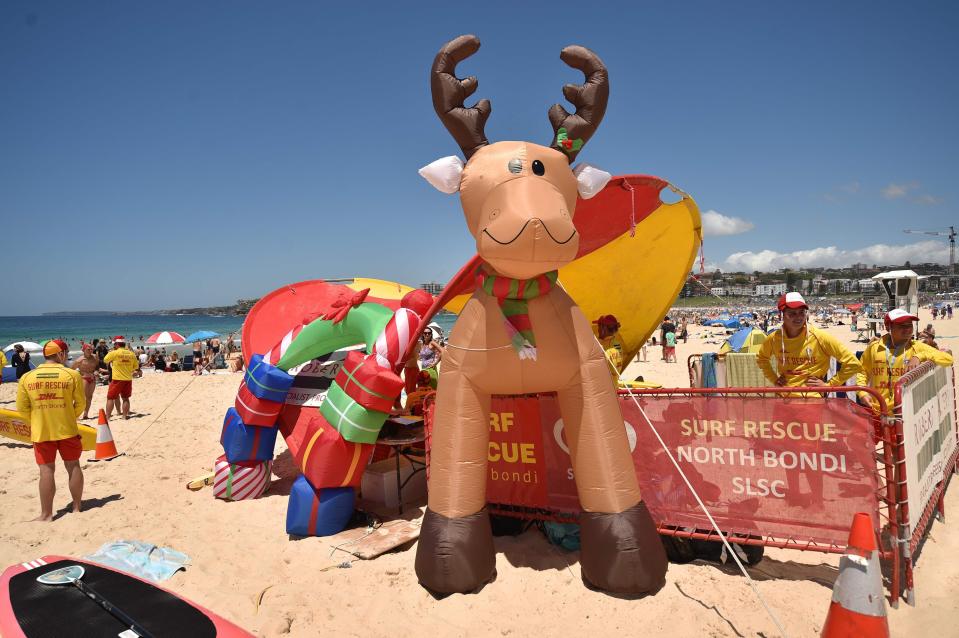  Every year the famous Sydney Beach is transformed into a sandy winter wonderland with inflatable reindeer and sunbathing santas