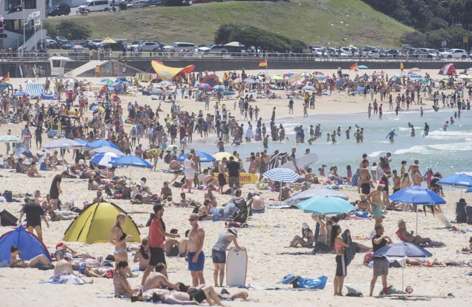  Thousands of tourists and locals hit the beach this Christmas