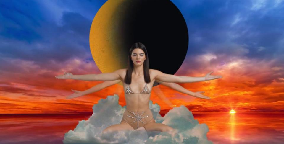  Kendall Jenner meditates in the clouds for her Love Advent Calendar video