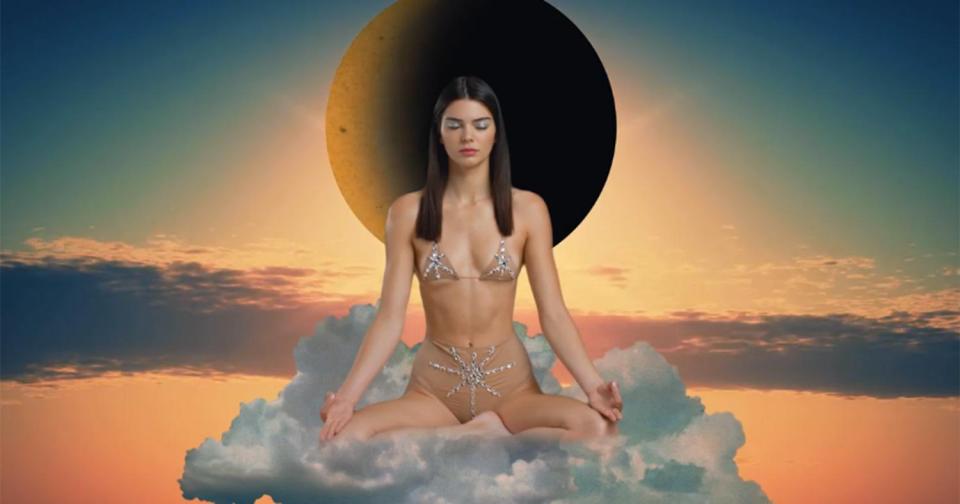  Kendall Jenner meditates on a cloud in the LOVE magazine shoot