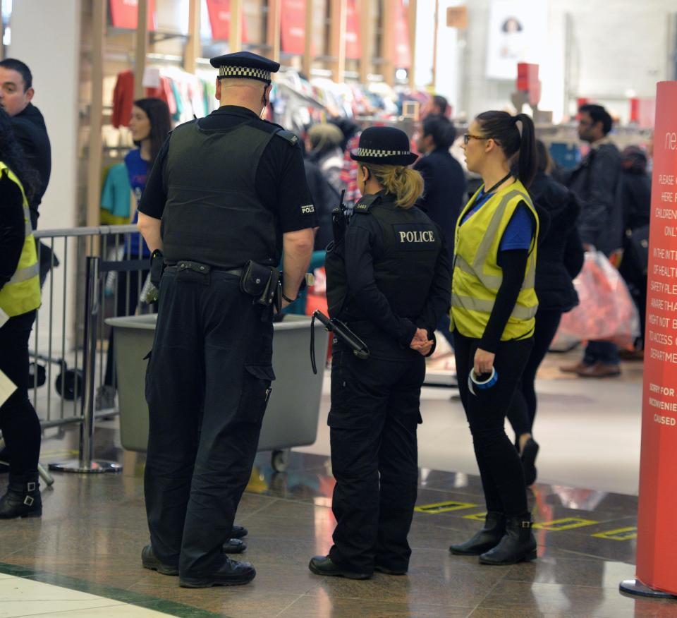  Cops guard shoppers in Manchester this morning. Similar measures are also being rolled out across the capital today