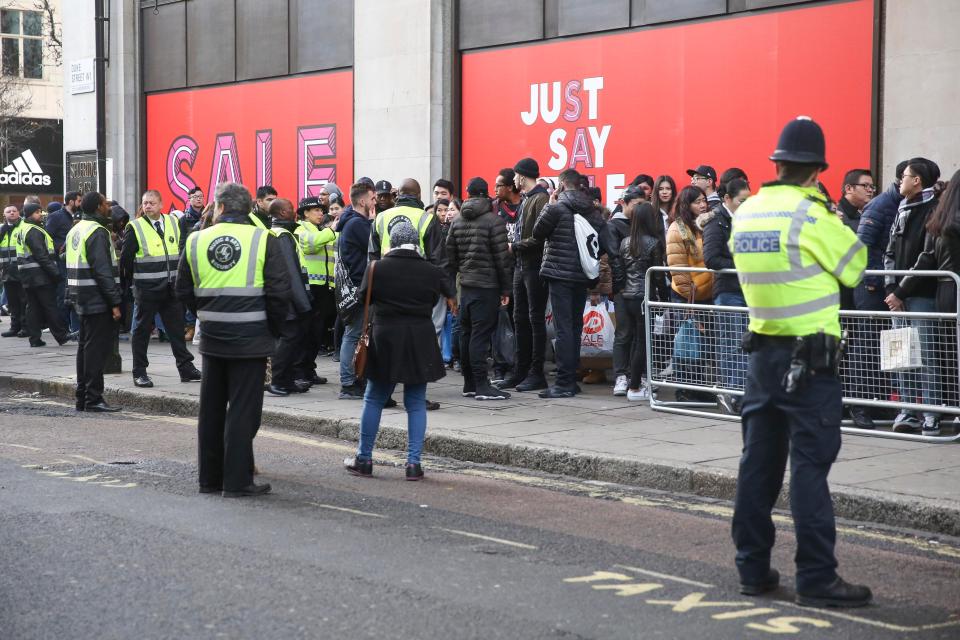  Store security and police officers were also on hand to guard shoppers