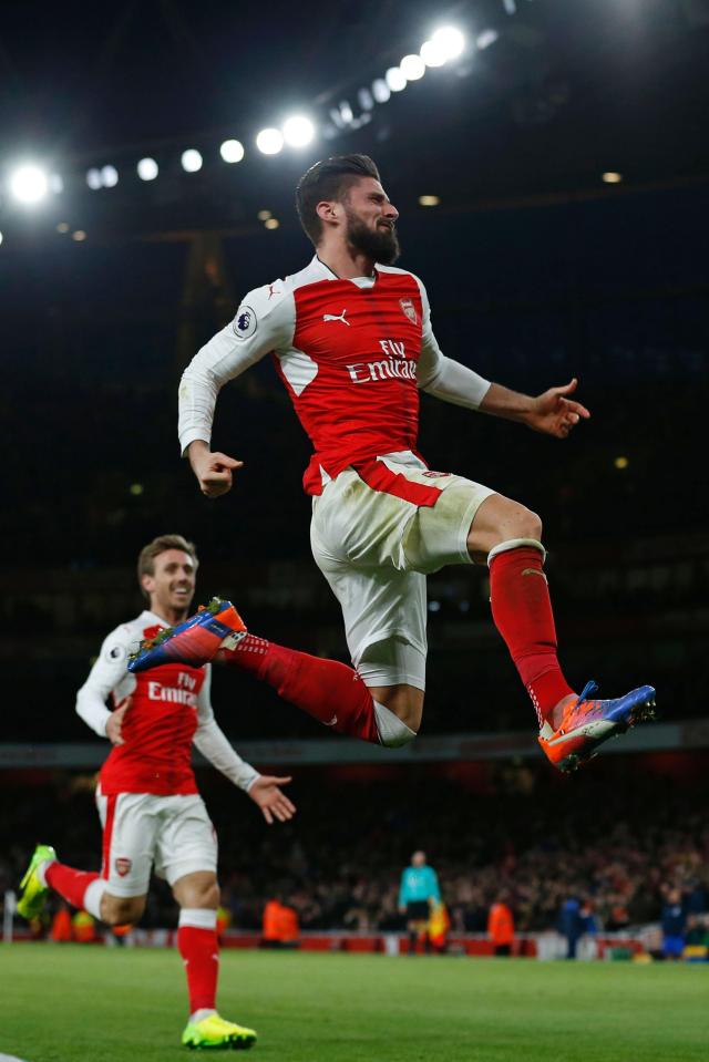  Olivier Giroud celebrates scoring the winner for Arsenal