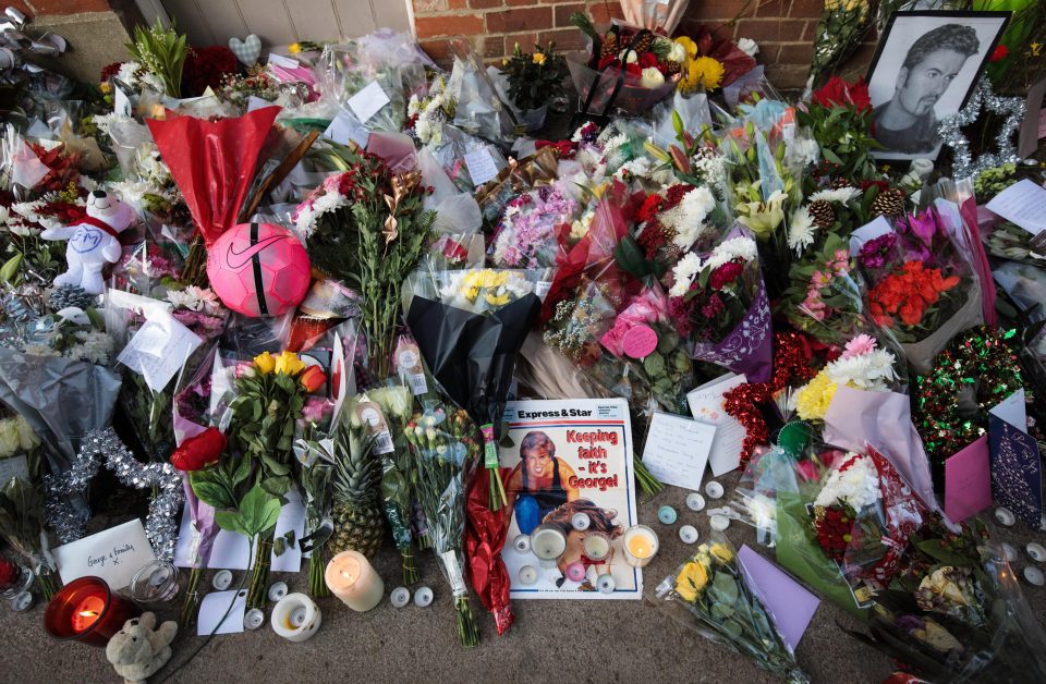  Flowers and tributes left outside George Michael's home