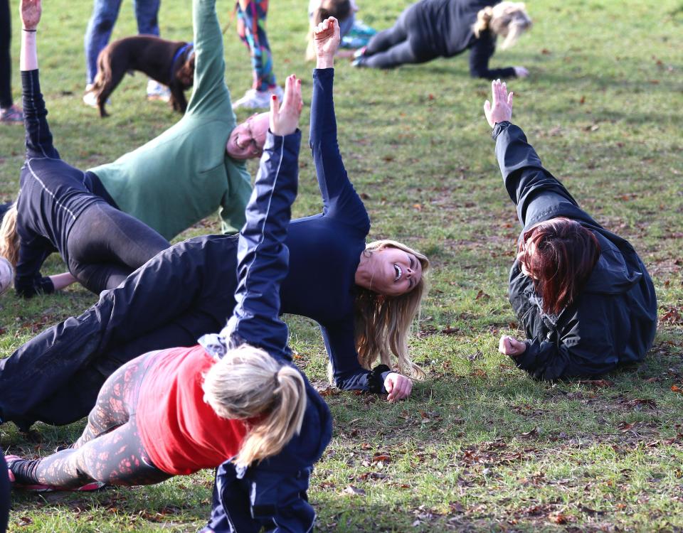  Stretch for it . . . tough course puts women through their paces