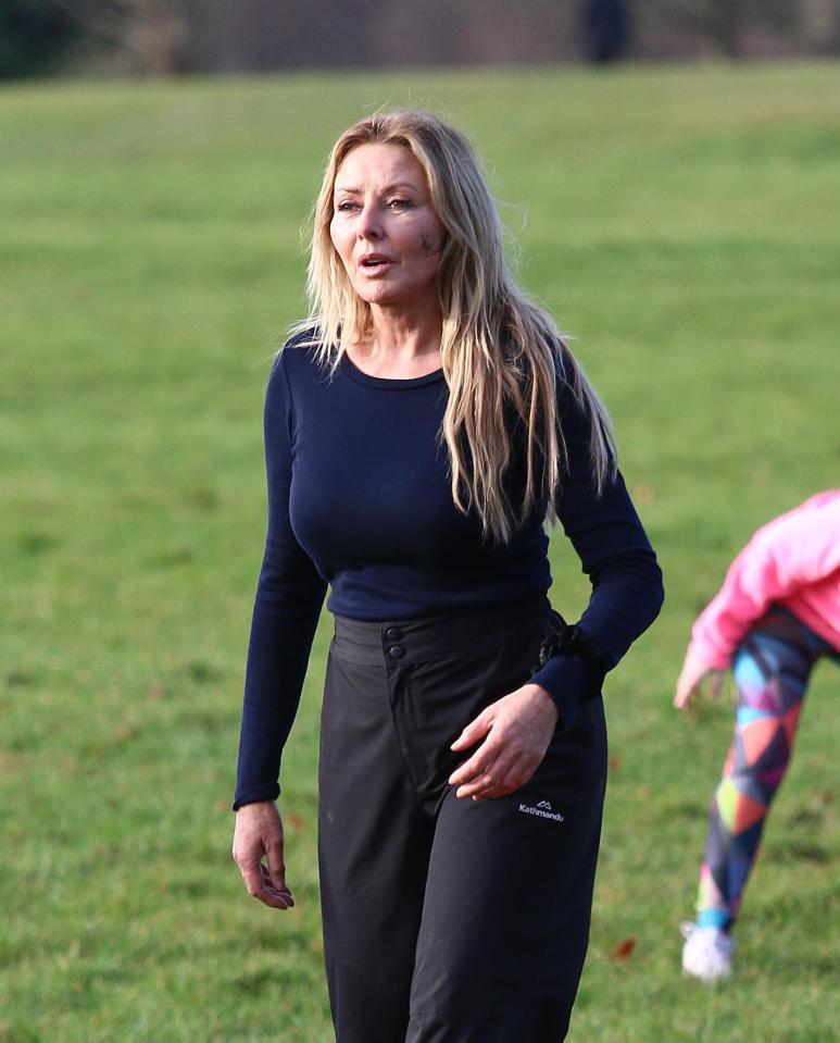  Ready? . . . Carol tires herself out on the field during training exercise