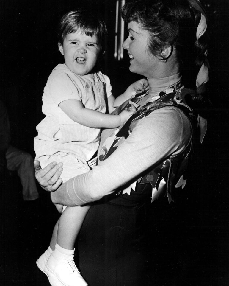  Carrie pictured with her mother Debbie who shot to fame in Singin' in the Rain