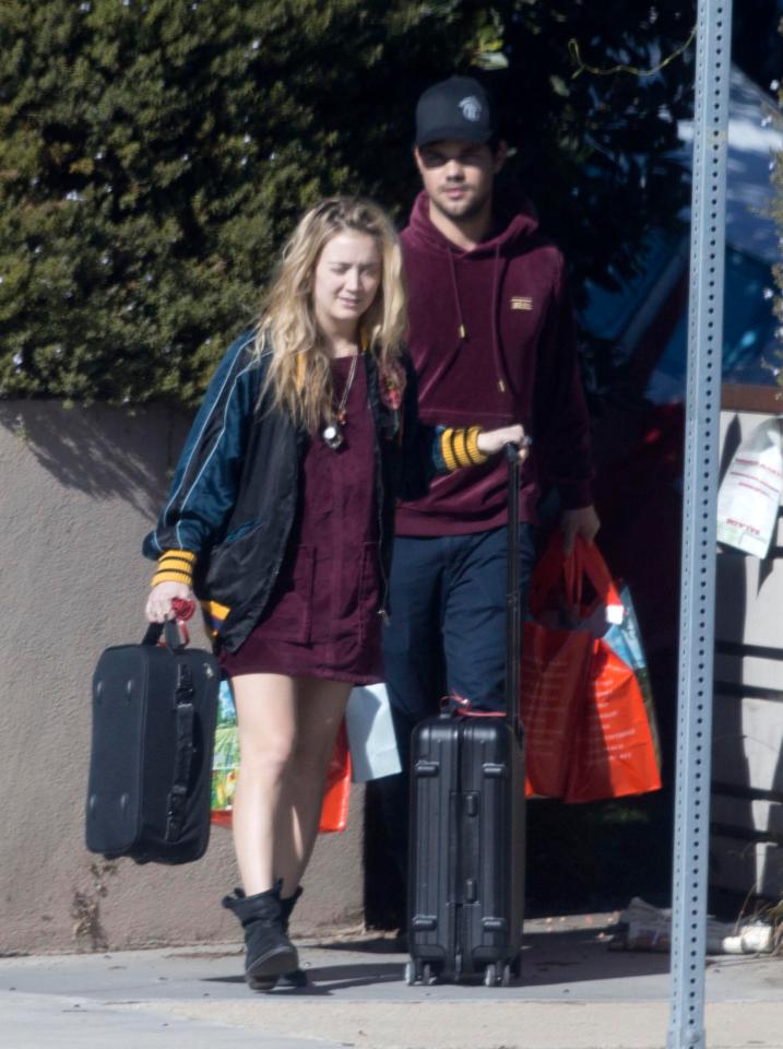  Taylor Lautner offers support to Billie Lourd as she leaves her Santa Monica home a day after the death of her mum