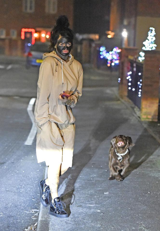  Dressed in a tracksuit, she was seen out with her dog