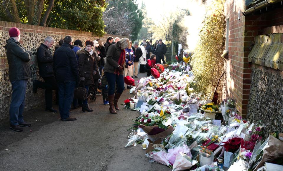  Flowers and notes have been left outside the Oxfordshire home of the star where he was found dead on Christmas Day