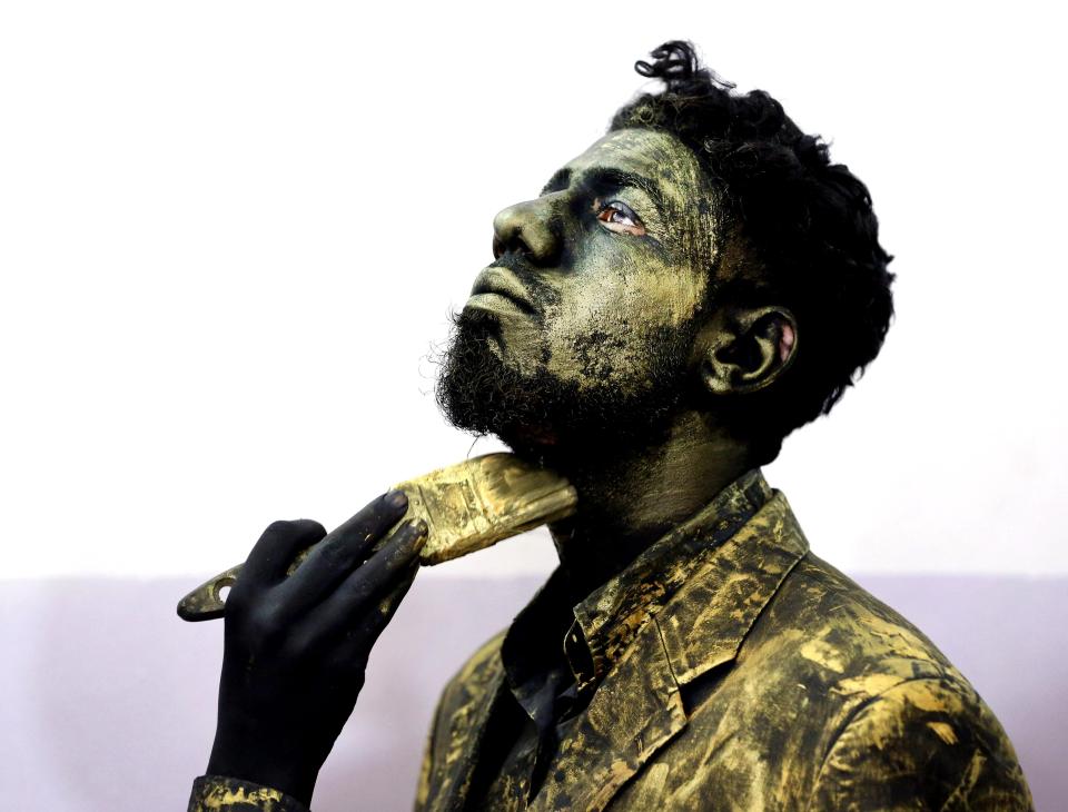  A performer in an Iraqi pantomime prepares for a show in Diwaniyah