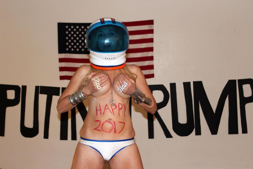  The 30-year-old stripped down to her underwear and a space helmet for the stunt