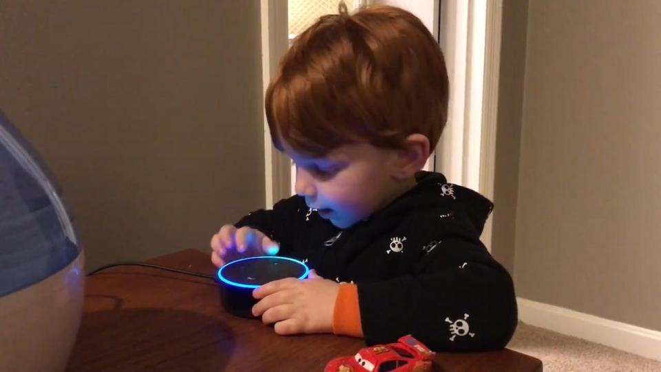  Footage shows the little boy talking into an Amazon Echo Dot