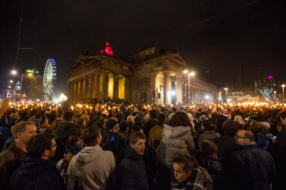  Thousands of people march through Edinburgh's City Centre towards Calton Hill with torch lights, lead by the Up Helly AA Vikings from Shetland