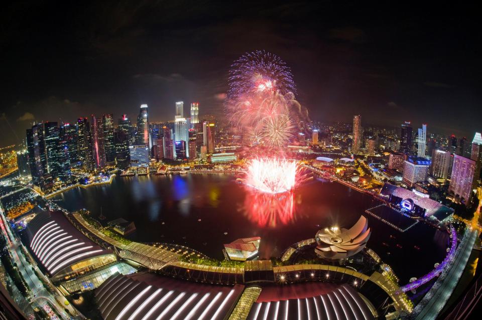  A stunning panoramic view of the shows the fireworks celebrating New Year during the Marina Bay Singapore 2017 countdown