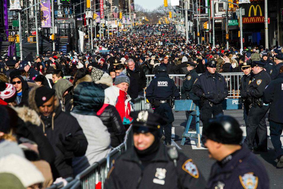  Police officers patrol Times Square before New Year's eve celebrations in New York which draws millions of spectators each year