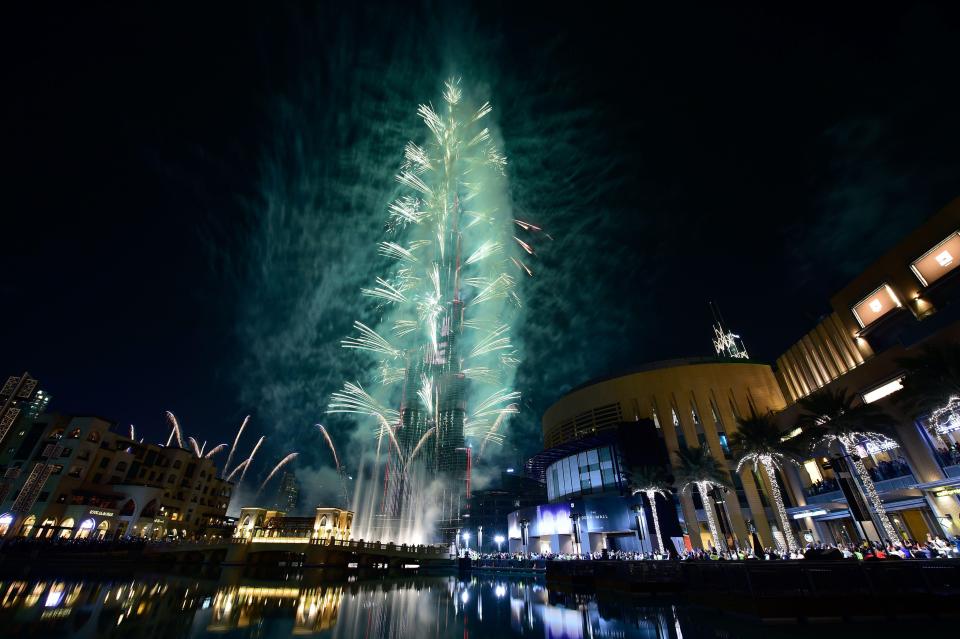  Fireworks explode from the Burj Khalifa, the world's tallest tower,