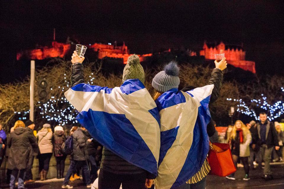  Thousands of revellers descend on Princes Street in Edinburgh where the city has enjoyed a huge parade and stunning fireworks display