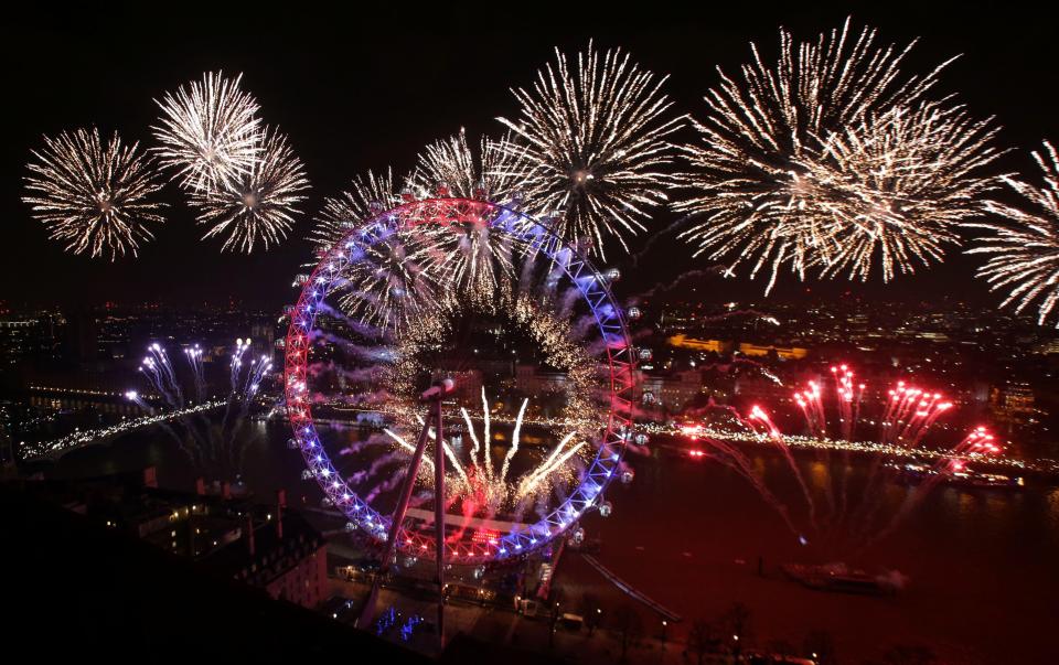  Thousands of people lined the banks of the River Thames in central London to see in the New Year with a spectacular fireworks display