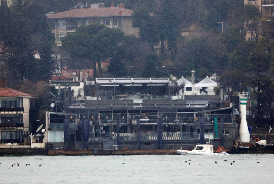  A Turkish coast guard boat patrols in front of the Reina nightclub today