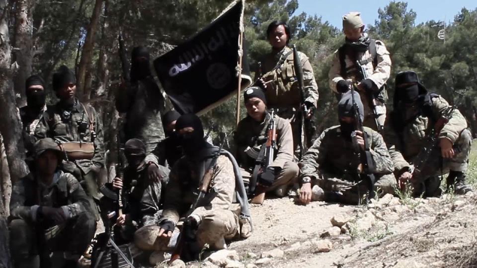  The militants bear the sinister black flag of ISIS