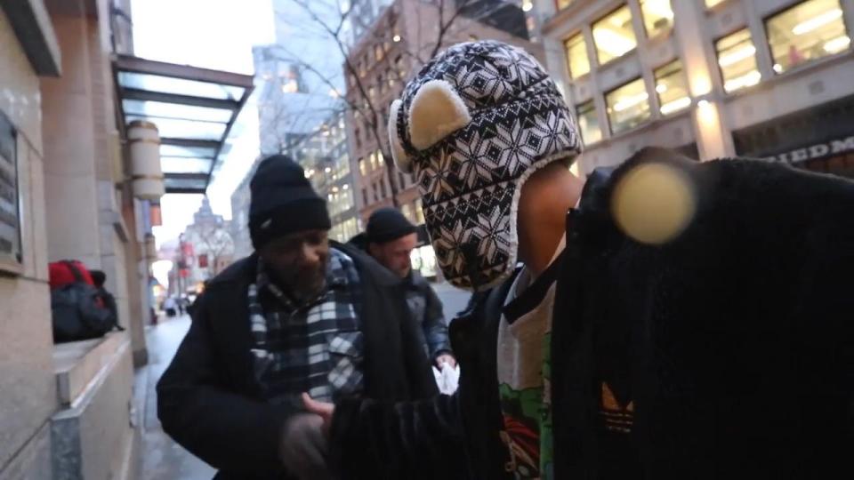  Adam Saleh hands this homeless man $50 after he intervenes