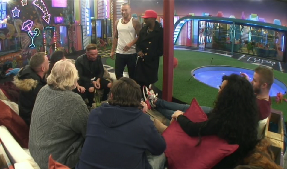  Calum walked into the garden as Coleen was talking to the housemates about him