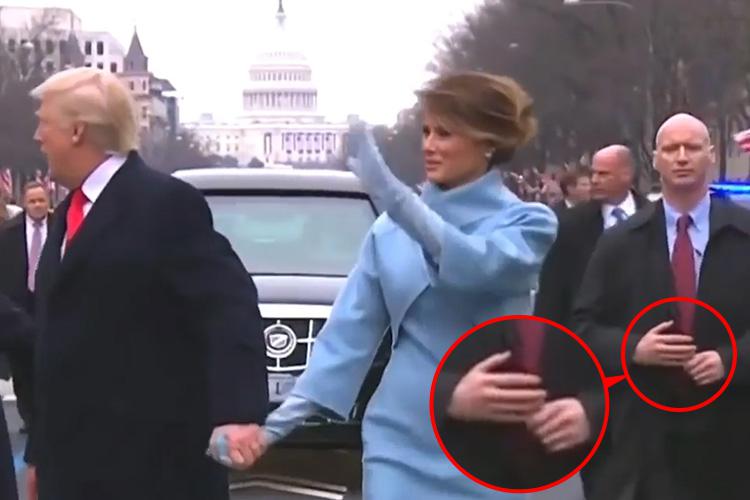  The secret service agent's clumsy looking arms led to speculation that they are fake - but now footage has emerged showing his hands moving