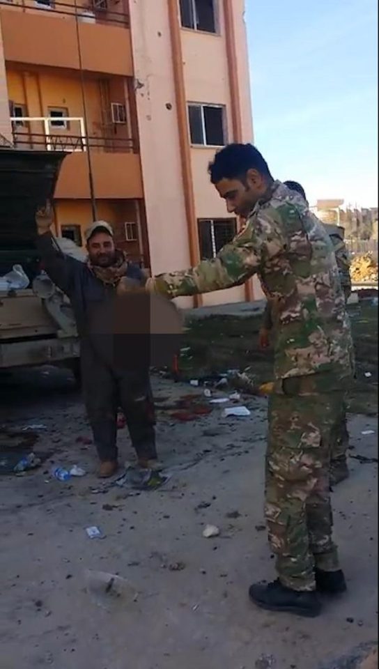  Harrowing footage has emerged of an Iraqi soldier allegedly dancing with the severed heads of ISIS fighters