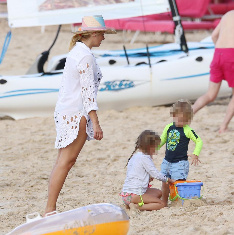  Holly appeared to be in charge of judging the sandcastle building competition