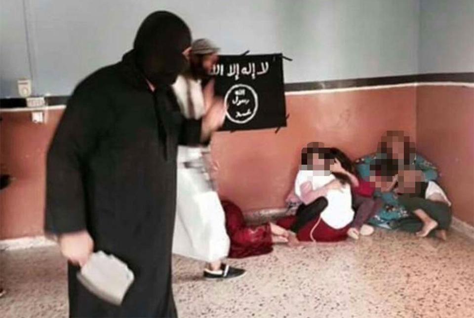  ISIS butcher Abu Abdel Rahman prepares to 'execute' women