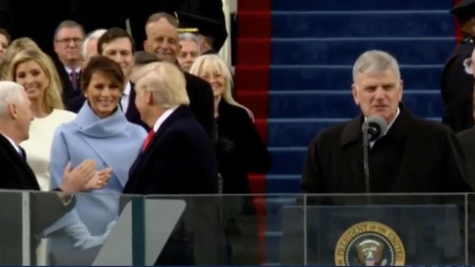  An awkward video caught the moment Melania Trump beamed at her husband during his inauguration before her face turns sombre as he turns around