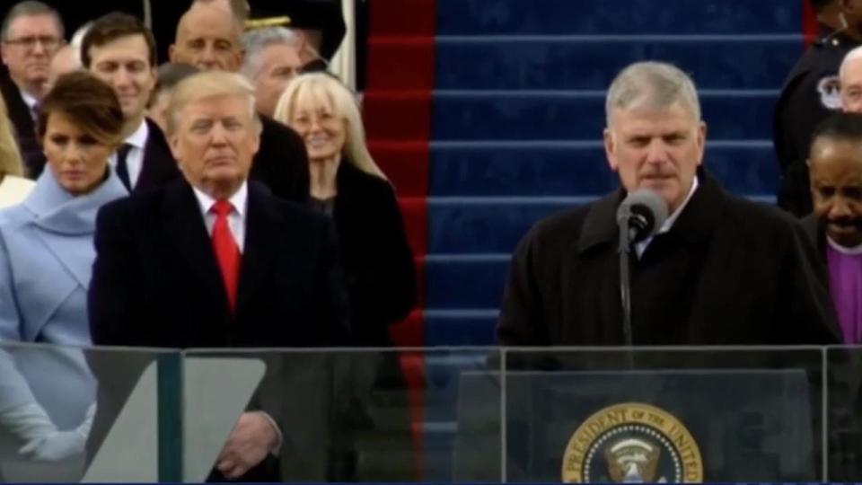  But her face quickly turns to a more sombre tone when President Trump turns around to speak to the crowd